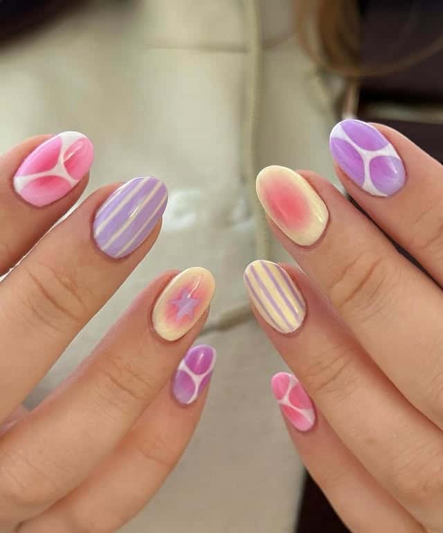 16. Lavender and Pink Pastel Swirl Oval Nails - cute and easy nail ideas