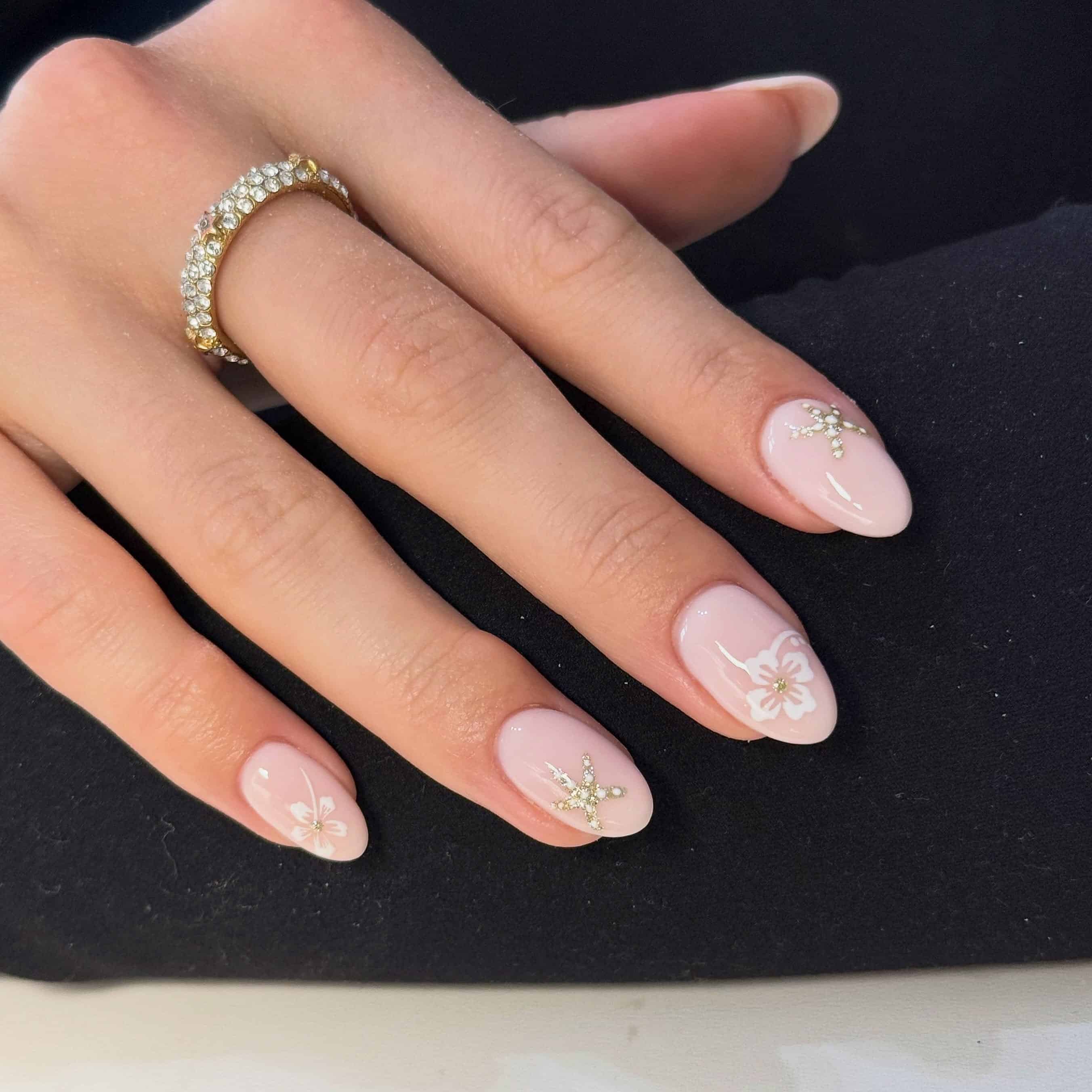 19. Soft Pink Floral Almond Nails with Gold Details - cute and easy nail ideas
