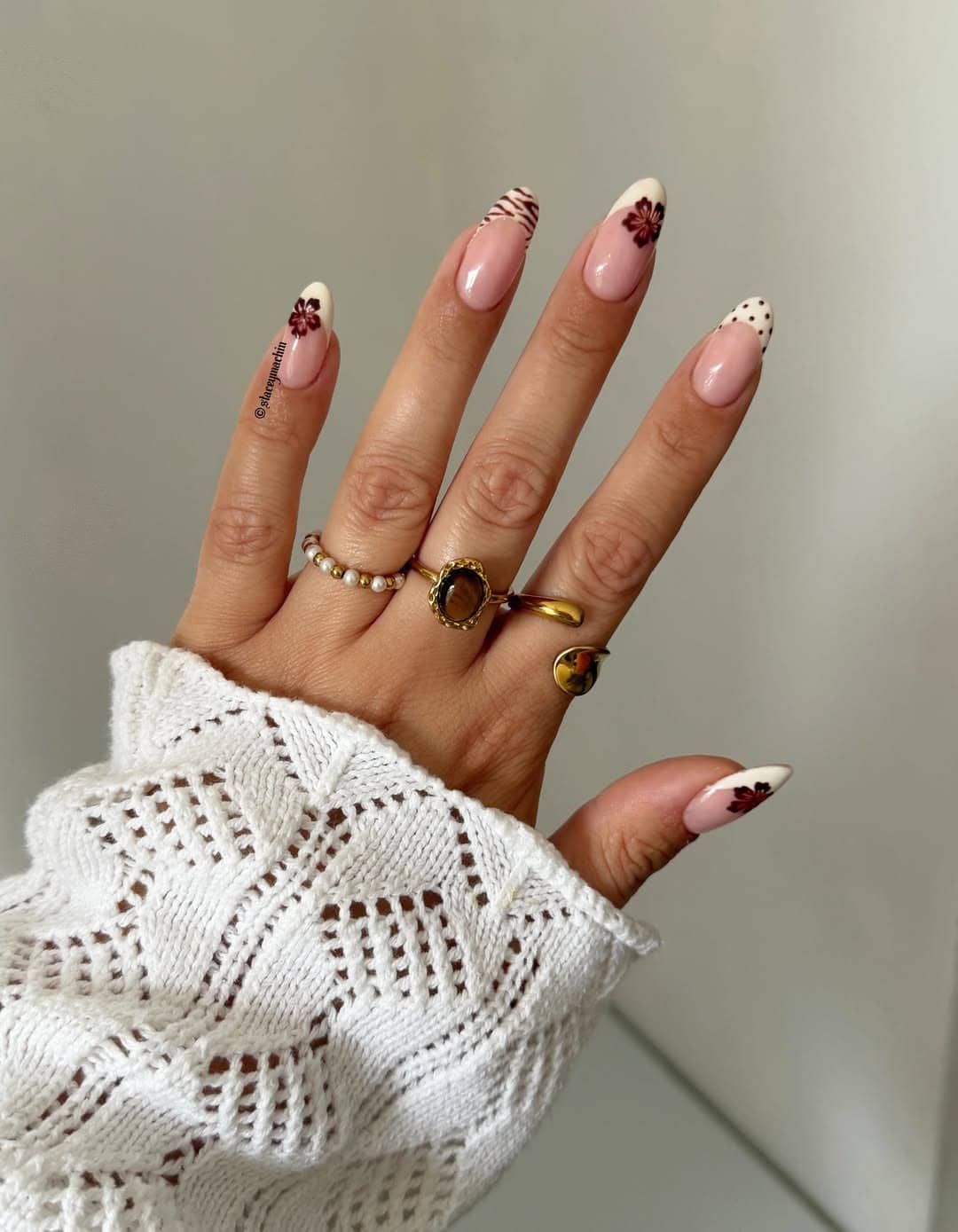 1. Brown Floral French Tip Almond Nails - easy short nail ideas
