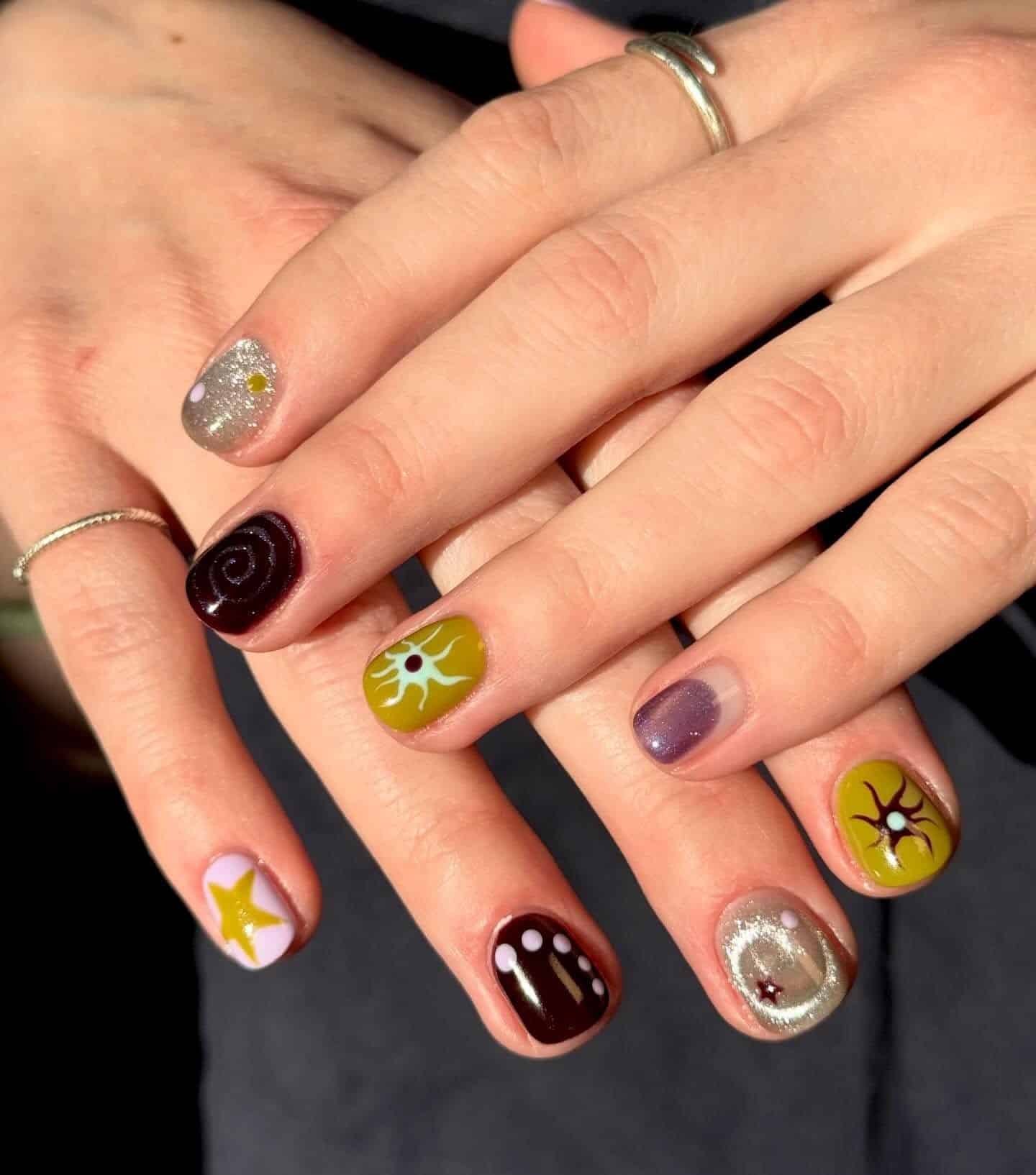 22. Retro Earth Tone Mix-and-Match Short Nails - easy short nail ideas