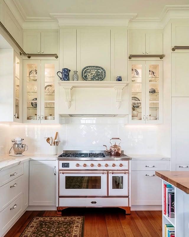 3. Classic White Kitchen Ideas with Blue Display Decor - timeless kitchen ideas