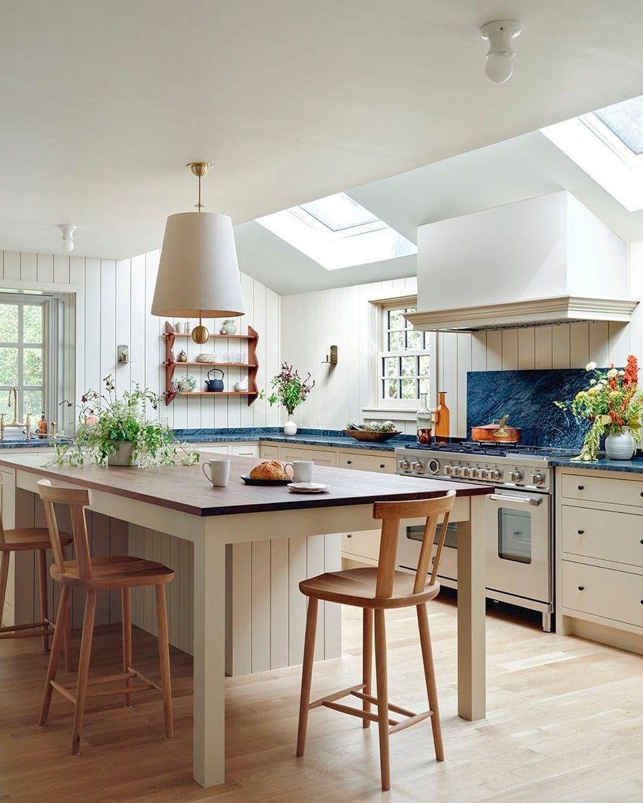 5. Cream Kitchen Ideas with Navy Stone Accents - timeless kitchen ideas