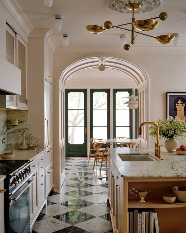 8. Marble and White Timeless Kitchen Ideas with Green French Doors - timeless kitchen ideas