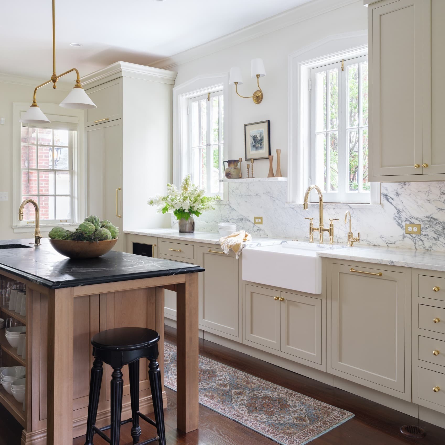 9. Cream Kitchen Ideas with Marble Backsplash and Gold Hardware - timeless kitchen ideas