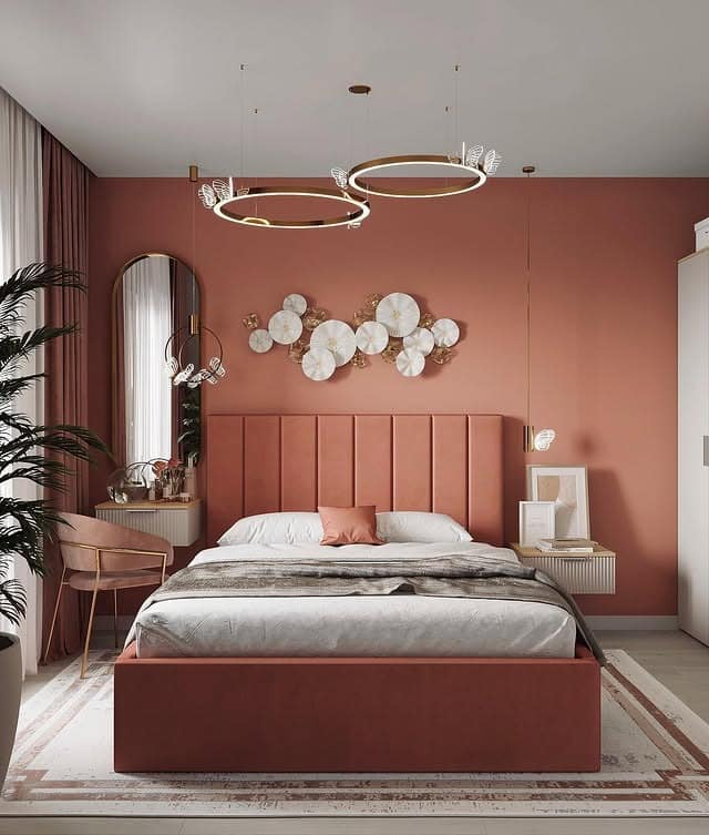 1. Burnt Orange Bedroom Ideas with Upholstered Wall Panels - orange bedroom ideas