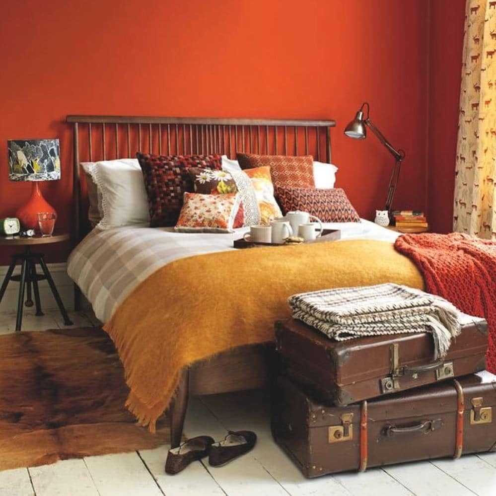 4. Rustic Orange Bedroom Ideas with Mustard Layers - orange bedroom ideas