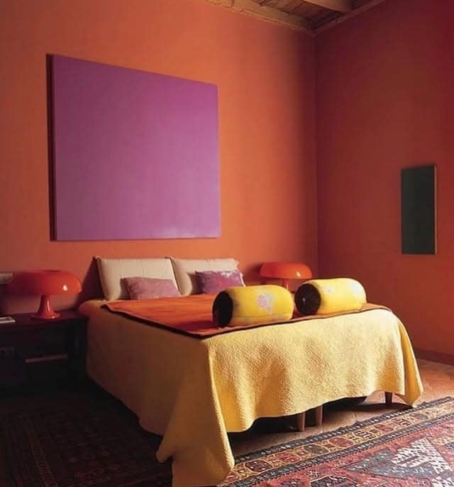 7. Earthy Orange Bedroom Ideas with Artistic Color Blocking - orange bedroom ideas