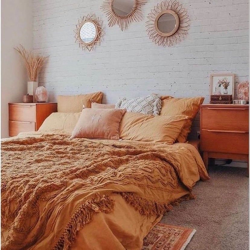 9. Soft Orange Bedroom Ideas with Neutral Textures - orange bedroom ideas