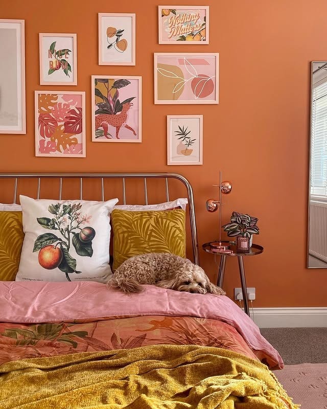 16. Soft Orange Bedroom Ideas with Botanical Gallery Wall - orange bedroom ideas