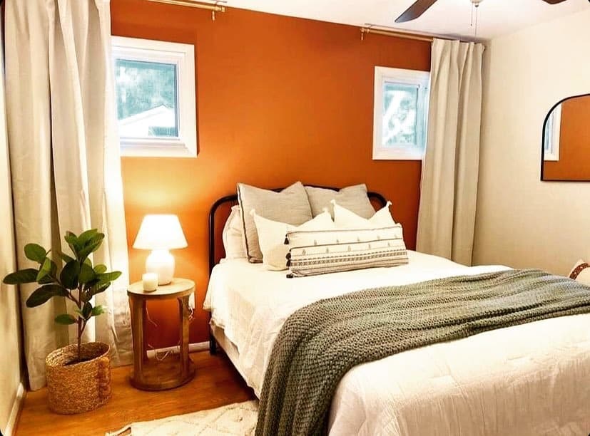 17. Rust Orange Bedroom Ideas with Neutral Styling - orange bedroom ideas