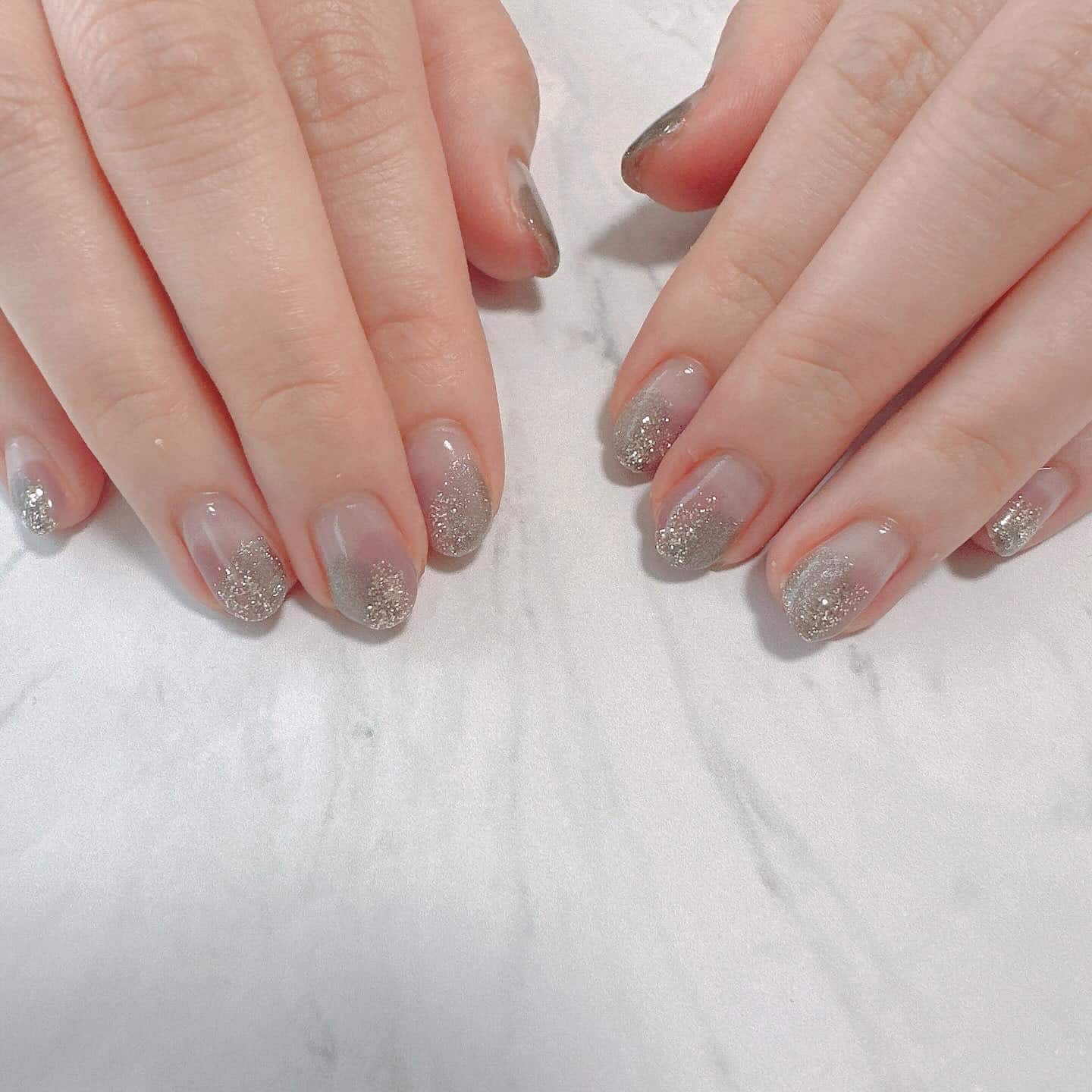 10. Sheer Gray Nails with Silver Glitter Tips - gray nail ideas