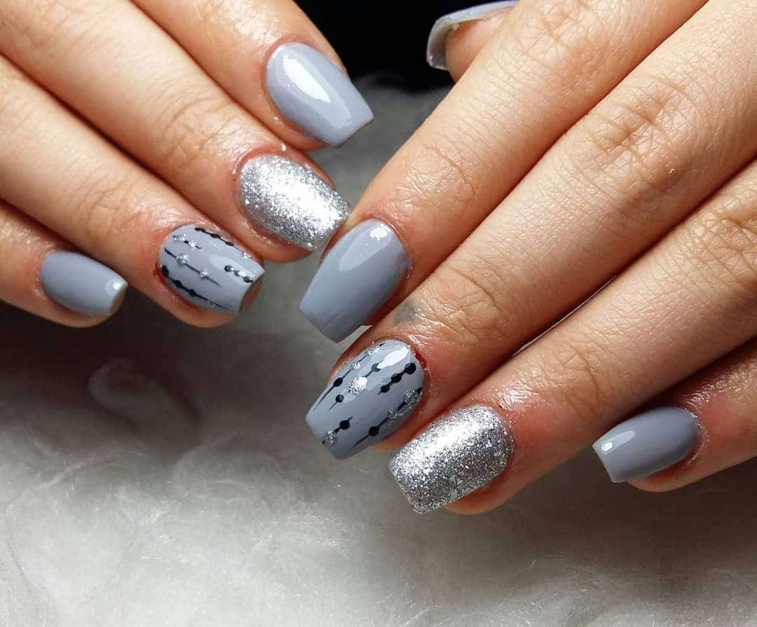 11. Light Gray Square Nails with Silver Glitter Accents - gray nail ideas