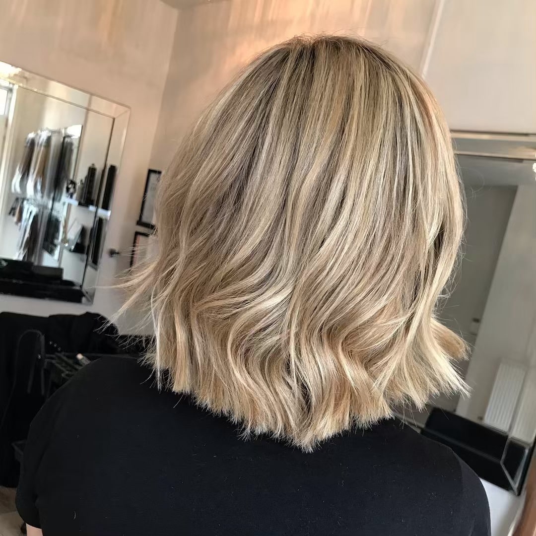 2. Champagne Blonde Textured Bob - Short Wavy Hairstyles