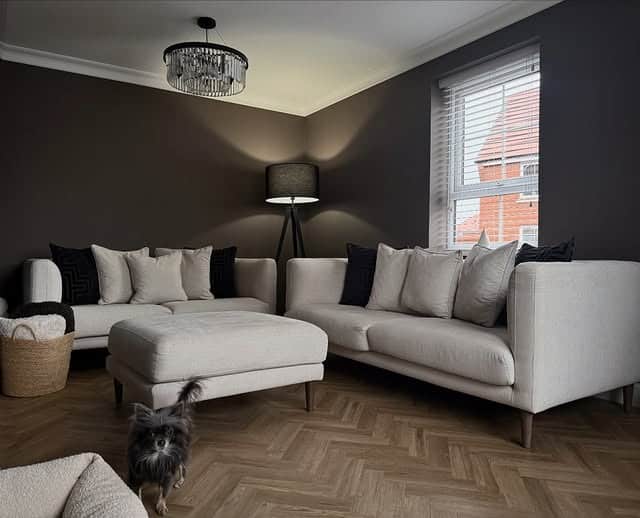 8. Modern Dark Living Room Ideas with White Sectional - dark living room ideas