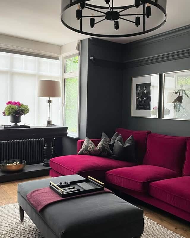 9. Bold Dark Living Room Ideas with Burgundy Sofa - dark living room ideas