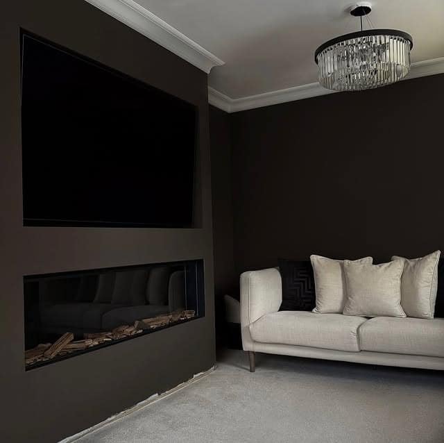 10. Contemporary Dark Living Room Ideas with Black Fireplace Wall - dark living room ideas