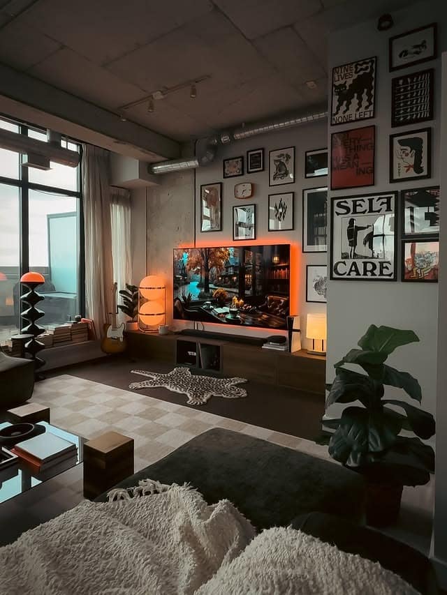 17. Industrial Dark Living Room Ideas with Charcoal and Warm Lighting - dark living room ideas