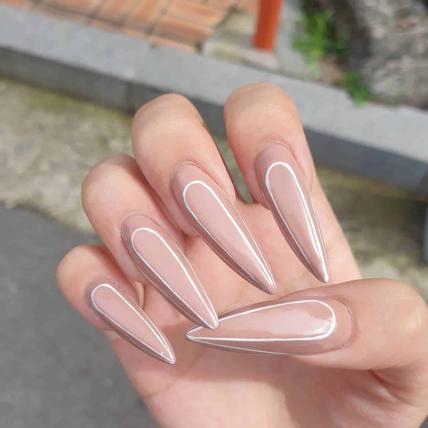 4. Chrome Outline Stiletto Line Nails - line nail ideas
