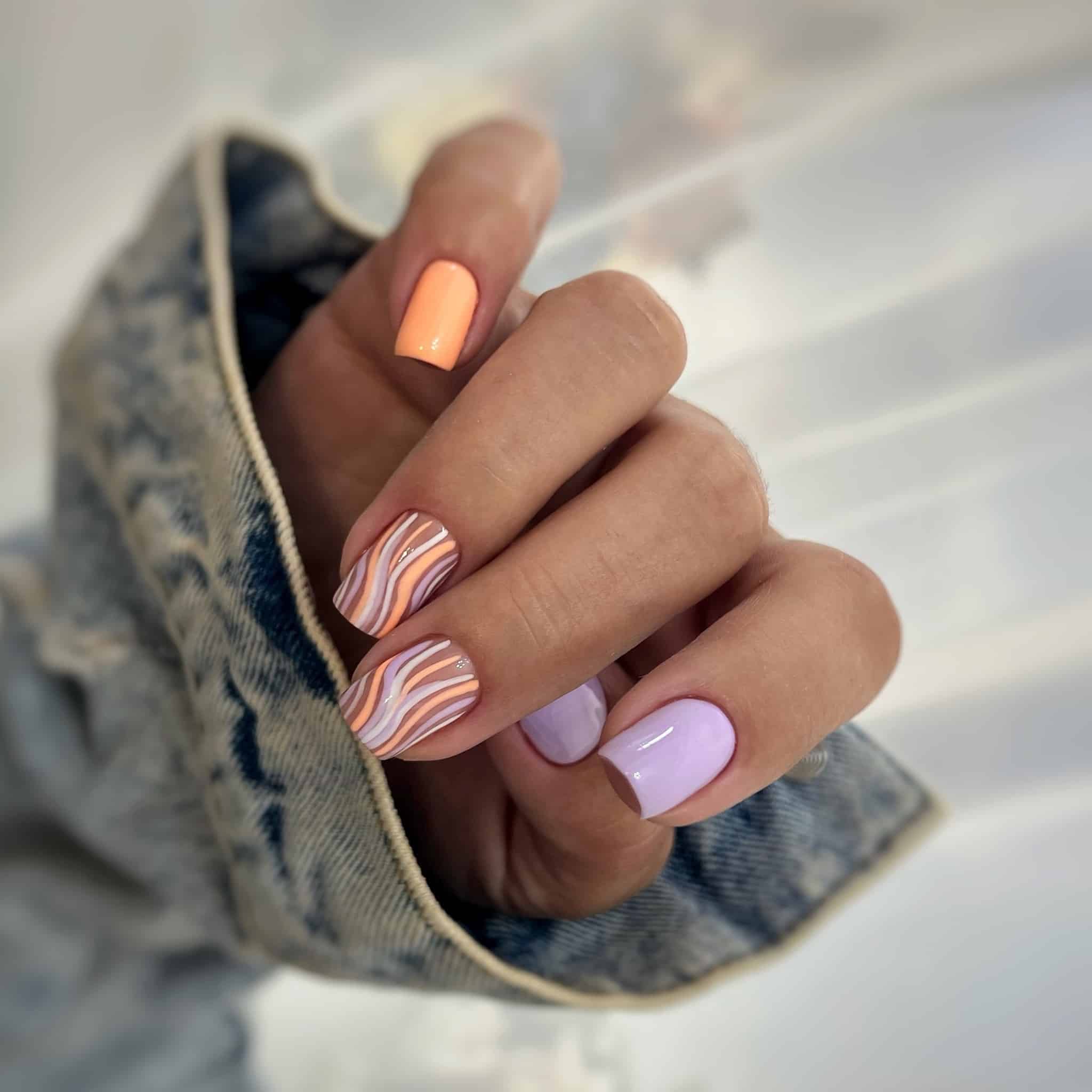 16. Pastel Peach and Lilac Wavy Line Nails - line nail ideas
