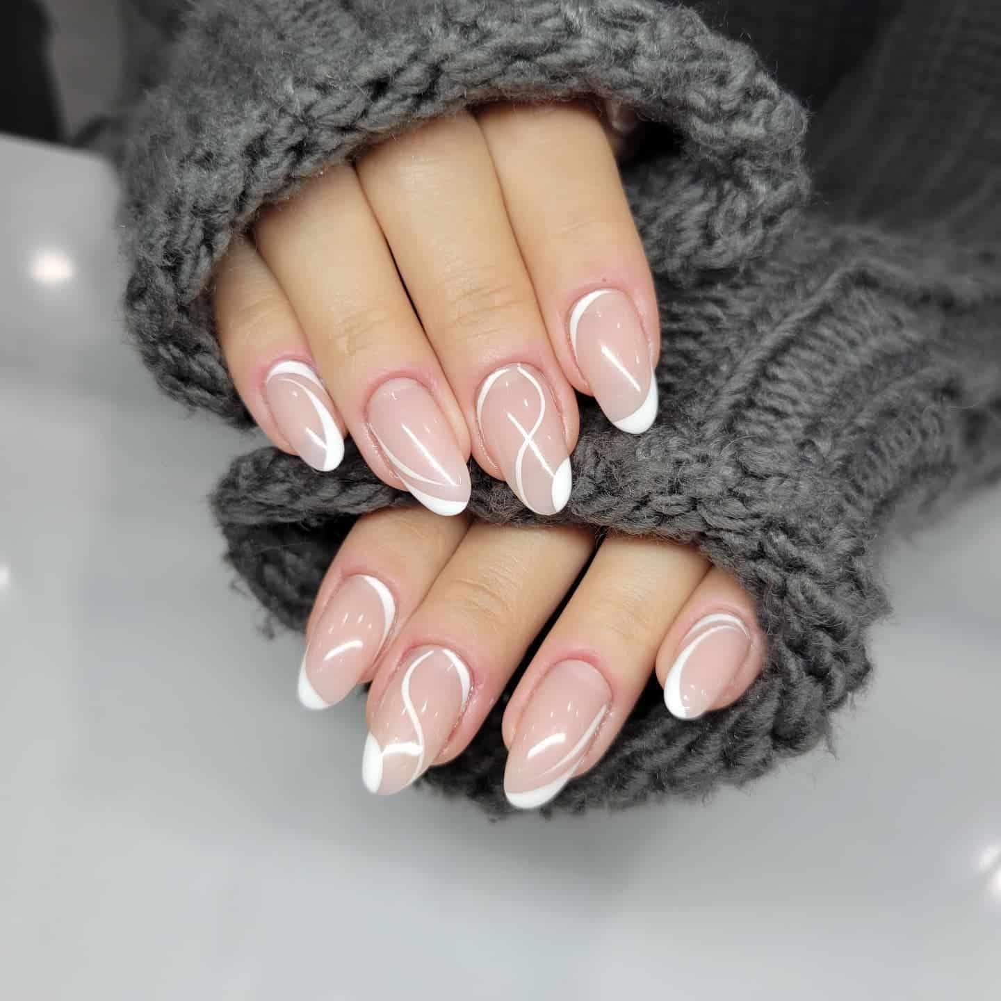 19. Elegant White Outline French Almond Nails - line nail ideas