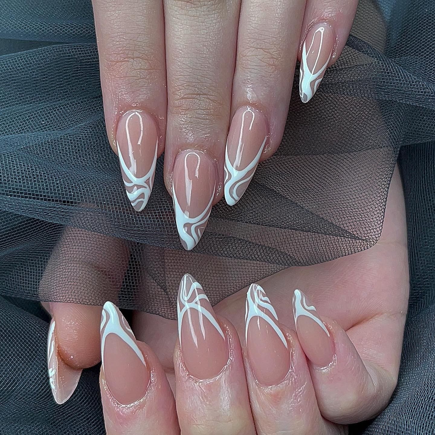 20. White Marble Swirl Stiletto Line Nails - line nail ideas