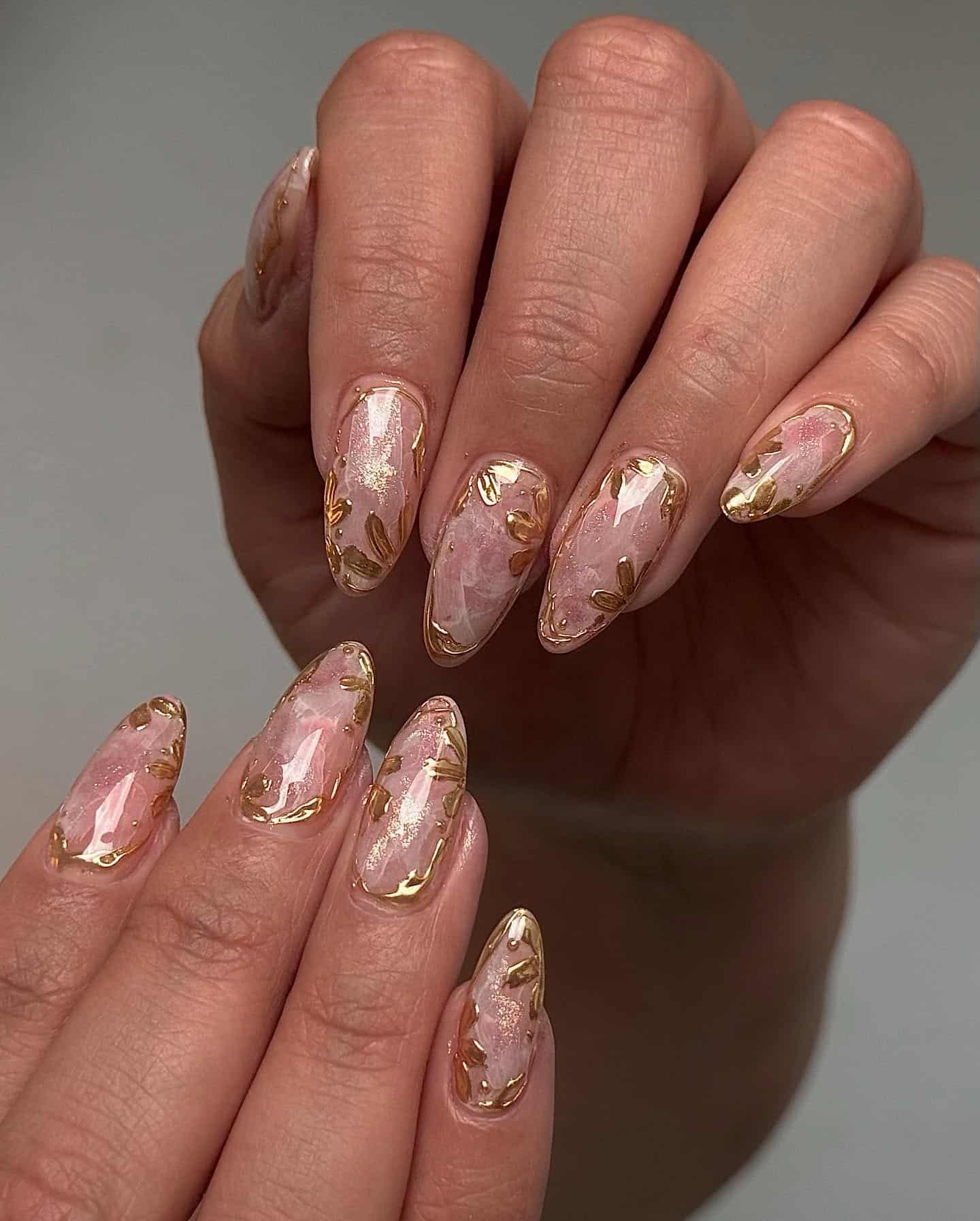 12. Blush Pink Almond Marble Nails with Gold Details - marble nail ideas