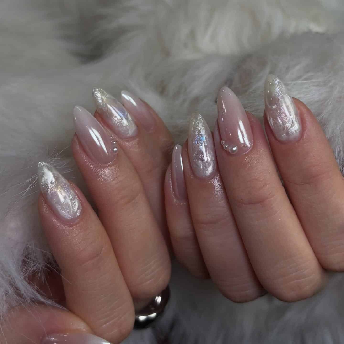 15. Pearl Chrome Almond Marble Nails - marble nail ideas