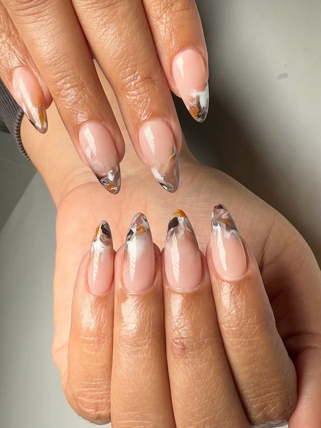 17. Neutral Almond Marble French Tips - marble nail ideas