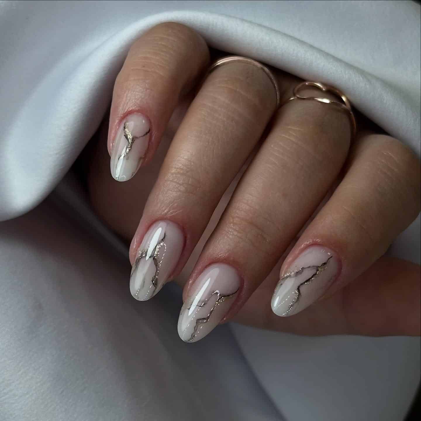 19. Minimal White Marble Almond Nails - marble nail ideas