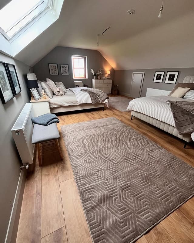 22. Gray Neutral Attic Bedroom Ideas with Spacious Family Layout - attic bedroom ideas
