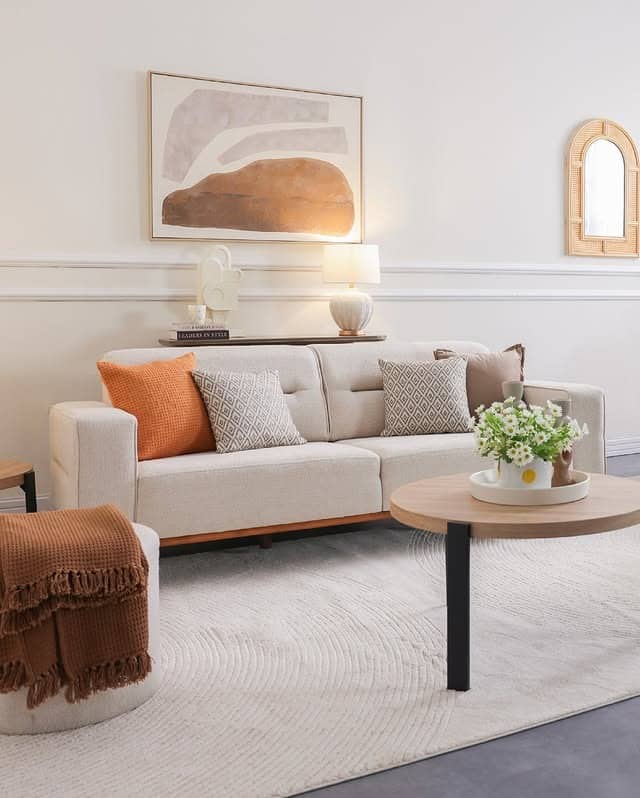 3. Soft Beige Earthy Living Room with Terracotta Accents - earthy living room ideas