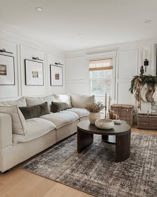8. Classic White Earthy Living Room with Charcoal Coffee Table - earthy living room ideas