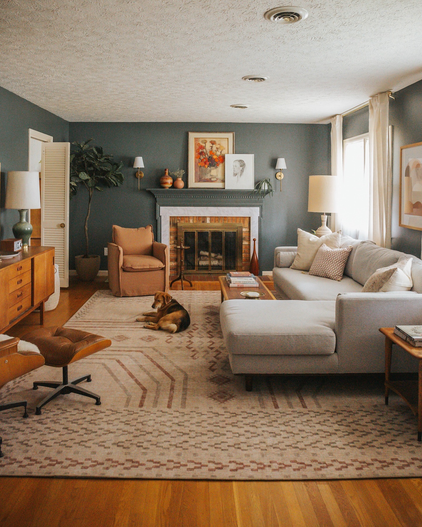 17. Moody Earthy Living Room with Slate Blue and Tan Decor - earthy living room ideas