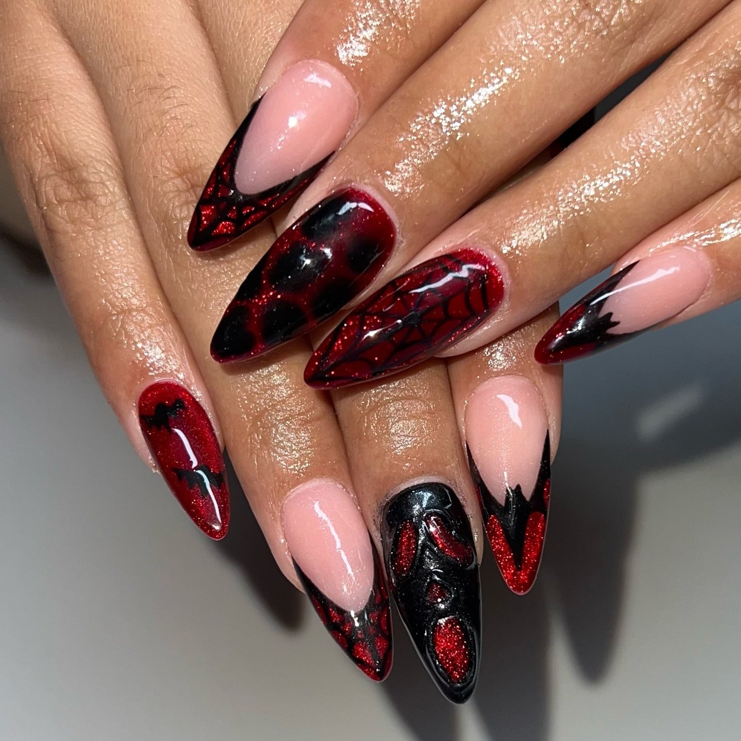1. Crimson Spider Web Stiletto Nails - red and black nail ideas
