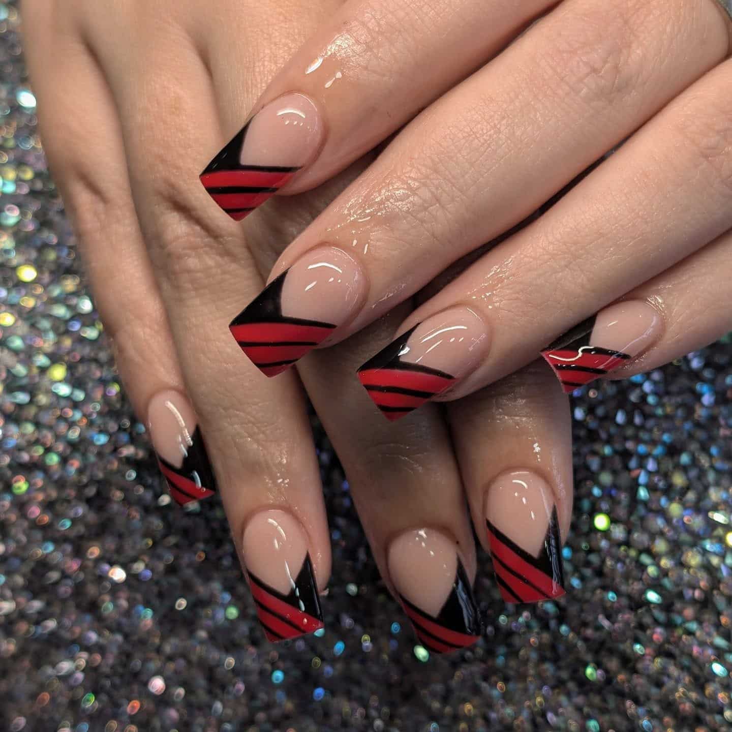 6. Red and Black Diagonal French Tip Nails - red and black nail ideas