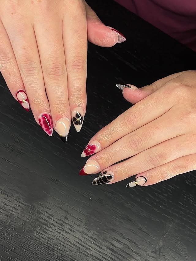 12. Burgundy Floral French Almond Nails - red and black nail ideas