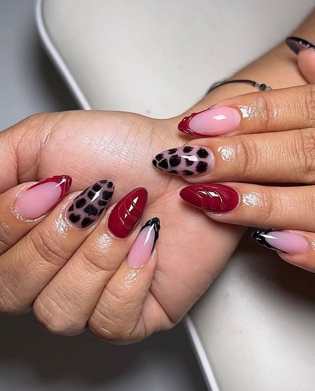 13. Burgundy Leopard Almond Nails - red and black nail ideas