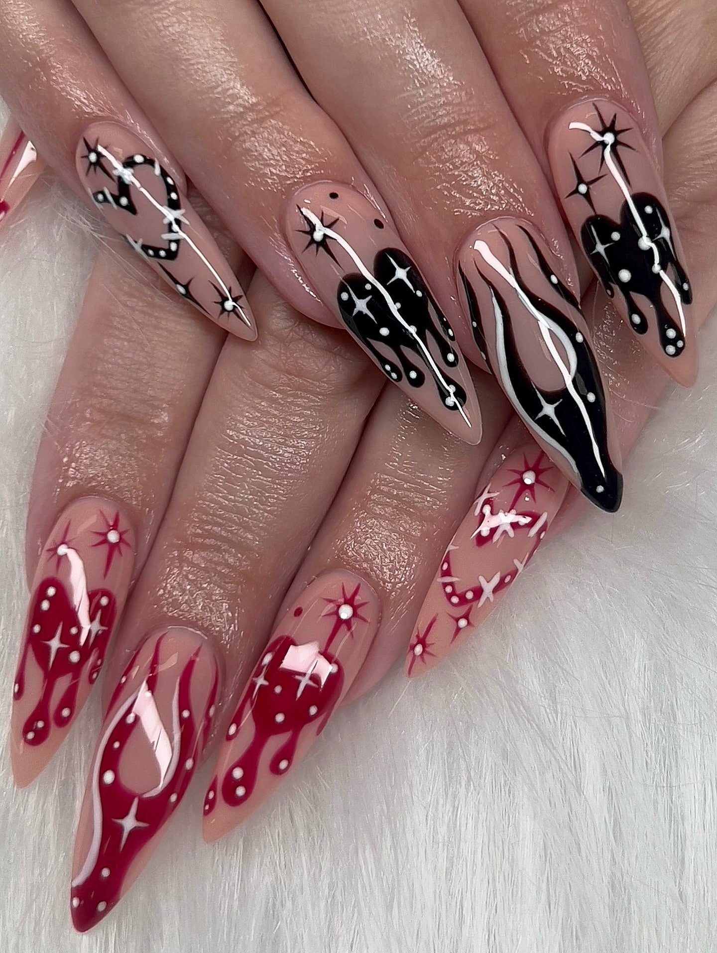17. Black and Red Drip Stiletto Nails - red and black nail ideas