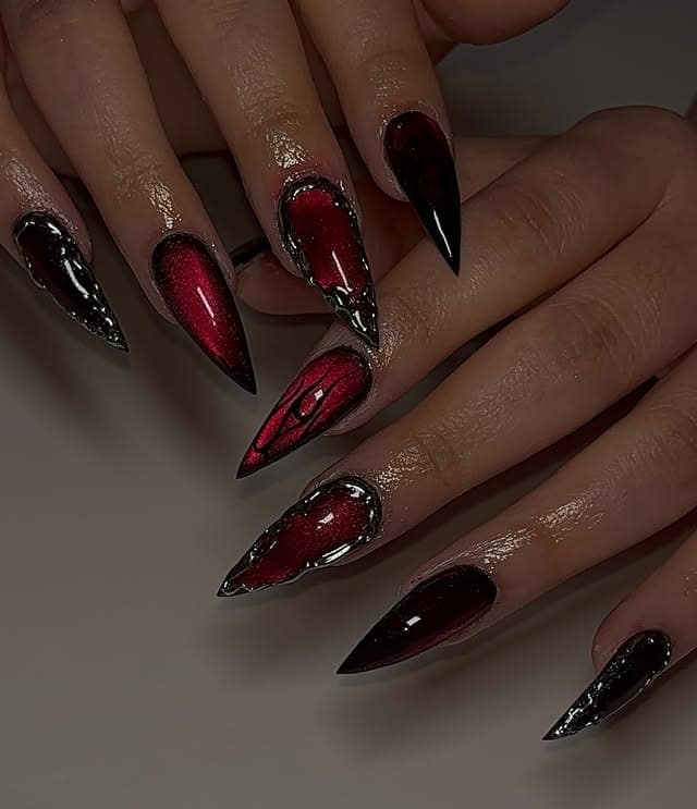 22. Black and Crimson Chrome Stiletto Nails - red and black nail ideas