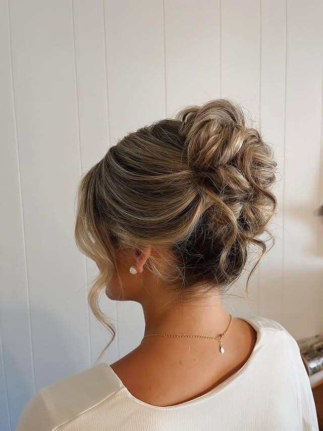 3. Soft Textured Blonde Updo - Bride Hairstyles