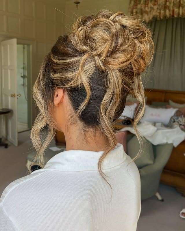 4. Voluminous Blonde Messy Bridal Bun - Bride Hairstyles