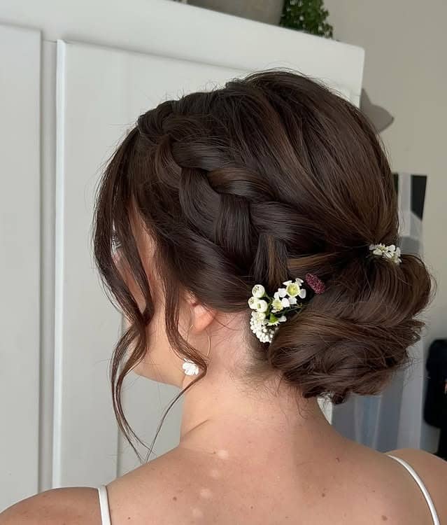 22. Elegant Braided Low Bun for Dark Brunette Hair - Bride Hairstyles