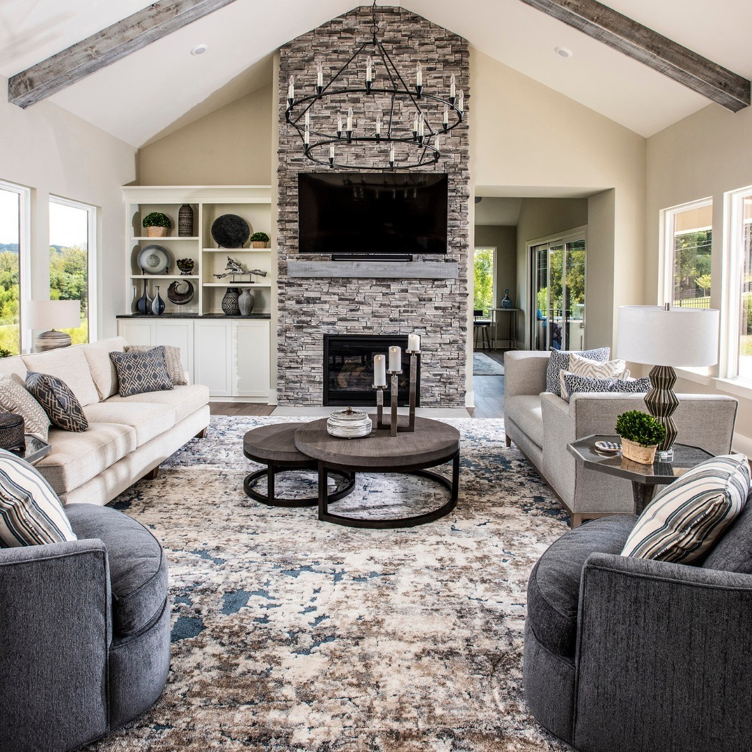 1. Blue and Gray Living Room Ideas with Stone Fireplace Feature - blue and gray living room ideas