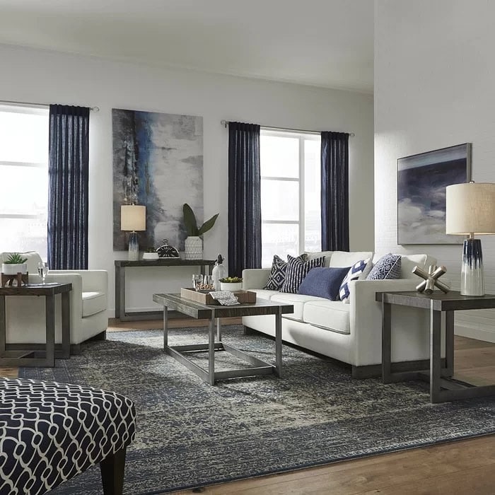 2. Modern Blue and Gray Living Room with Crisp White Seating - blue and gray living room ideas