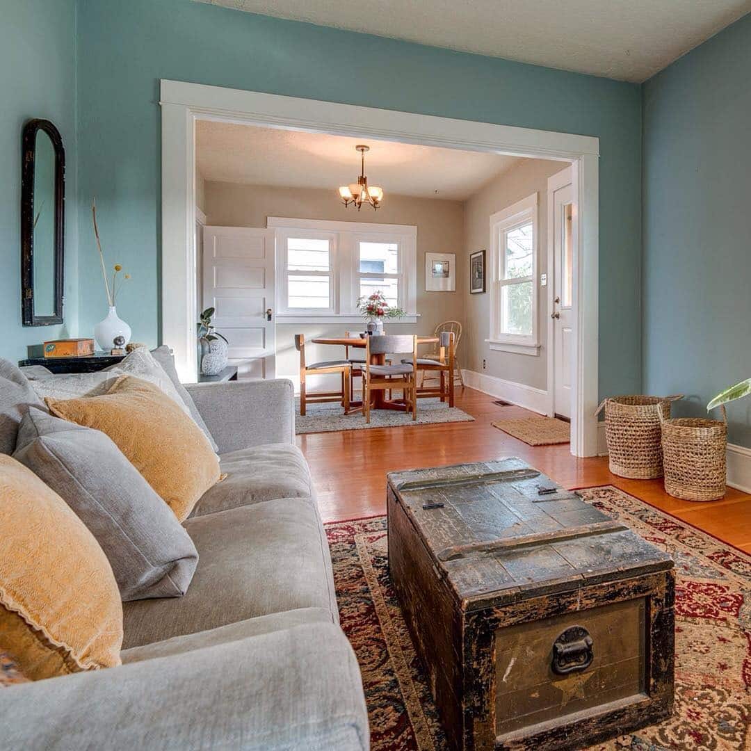 5. Soft Blue and Gray Living Room with Vintage Charm - blue and gray living room ideas