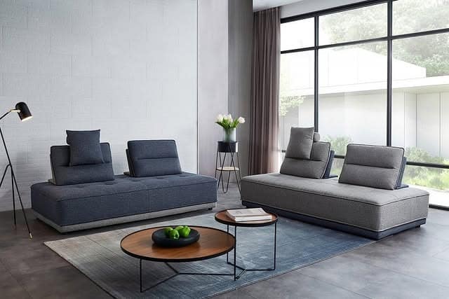 13. Minimalist Blue and Gray Living Room with Modern Lounge Seating - blue and gray living room ideas