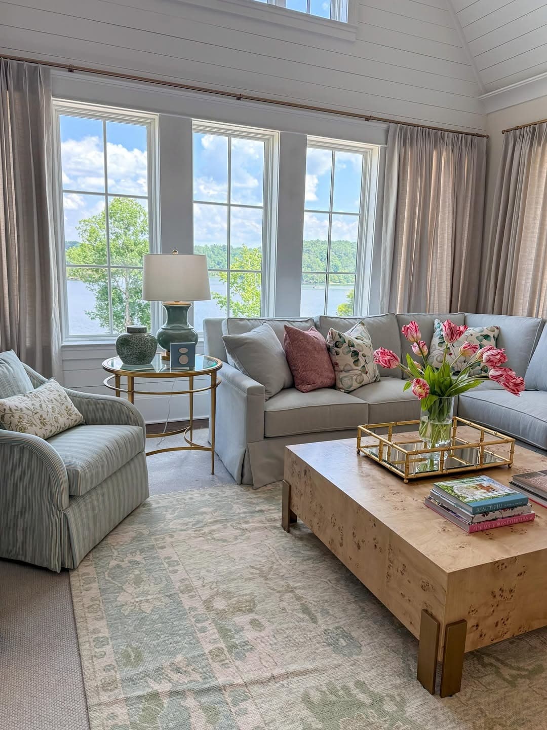 19. Bright Blue and Gray Living Room with Scenic Views - blue and gray living room ideas