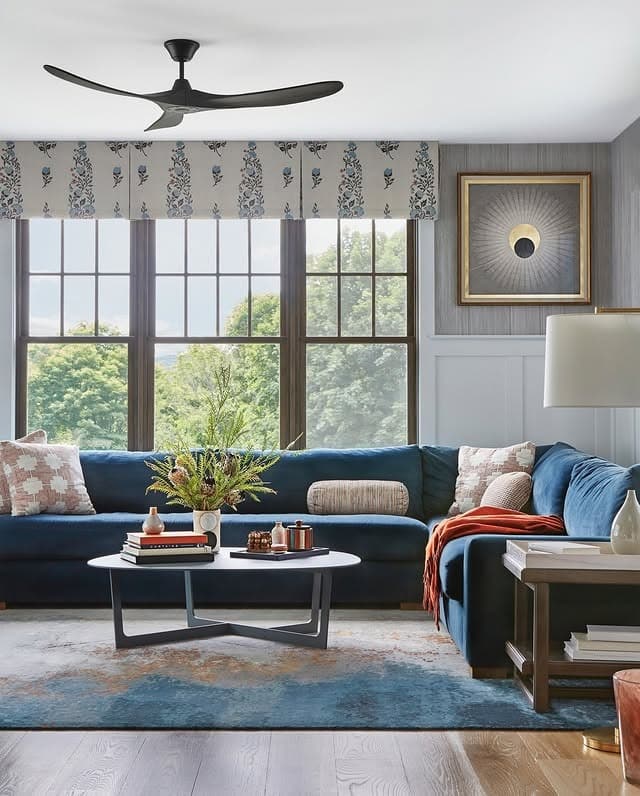 20. Contemporary Blue and Gray Living Room with Navy Sofa - blue and gray living room ideas