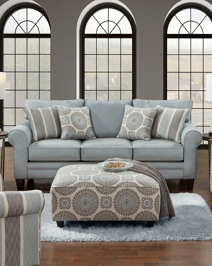22. Classic Blue and Gray Living Room with Arched Windows - blue and gray living room ideas