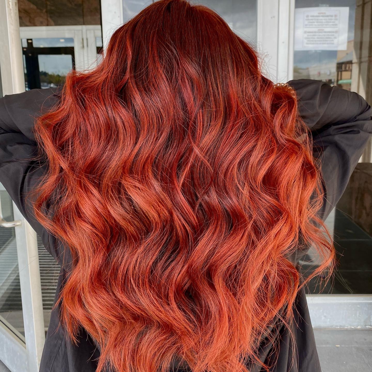 2. Long Wavy Red Orange Balayage - Red Orange Hair Color